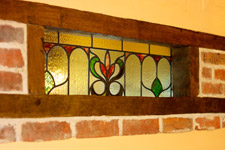 Beautiful stained glass panel in the Breakfast Room